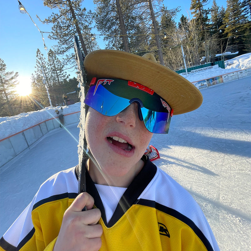 / Z87+ Blue | wow.JPG | Kid in a hockey rink wearing Pit Viper Sunglasses