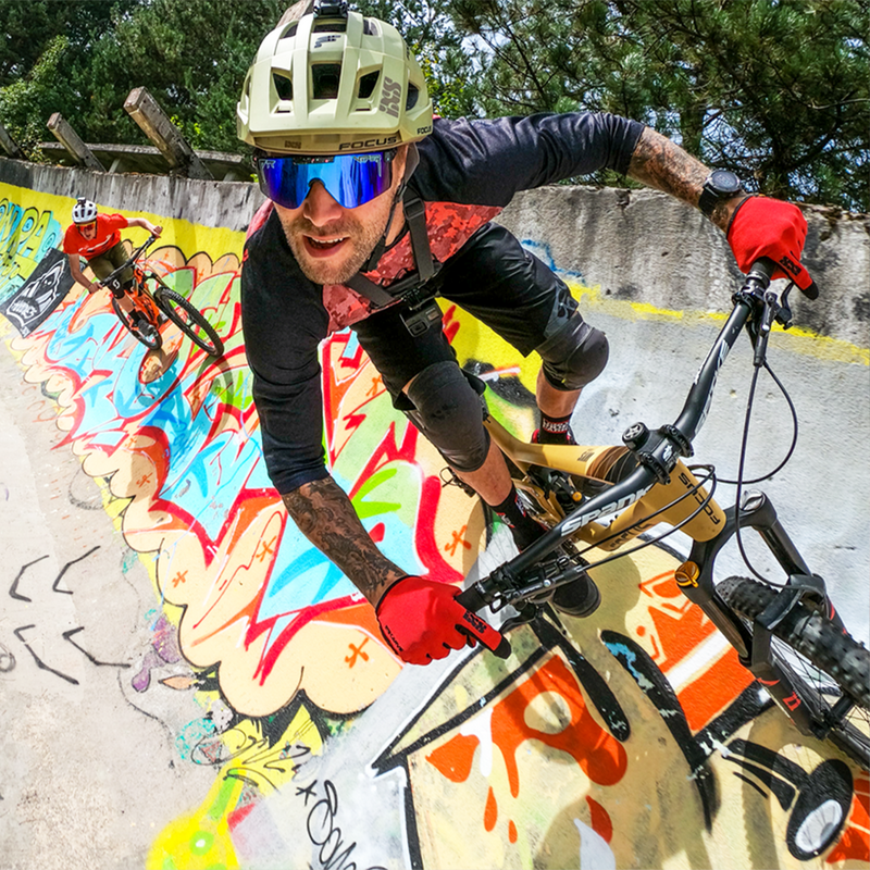 / Z87+ Blue | chicken_butt.JPG | Man riding a bike wearing Pit Viper Sunglasses