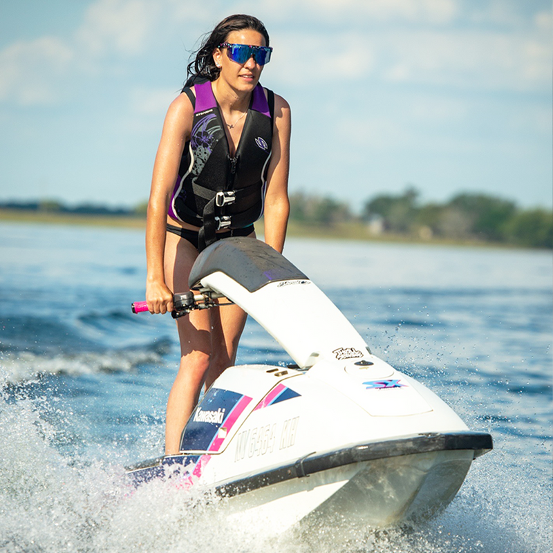 / Z87+ Blue | chicken_poo.JPG | Woman on a jetski wearing Pit Viper Sunglasses