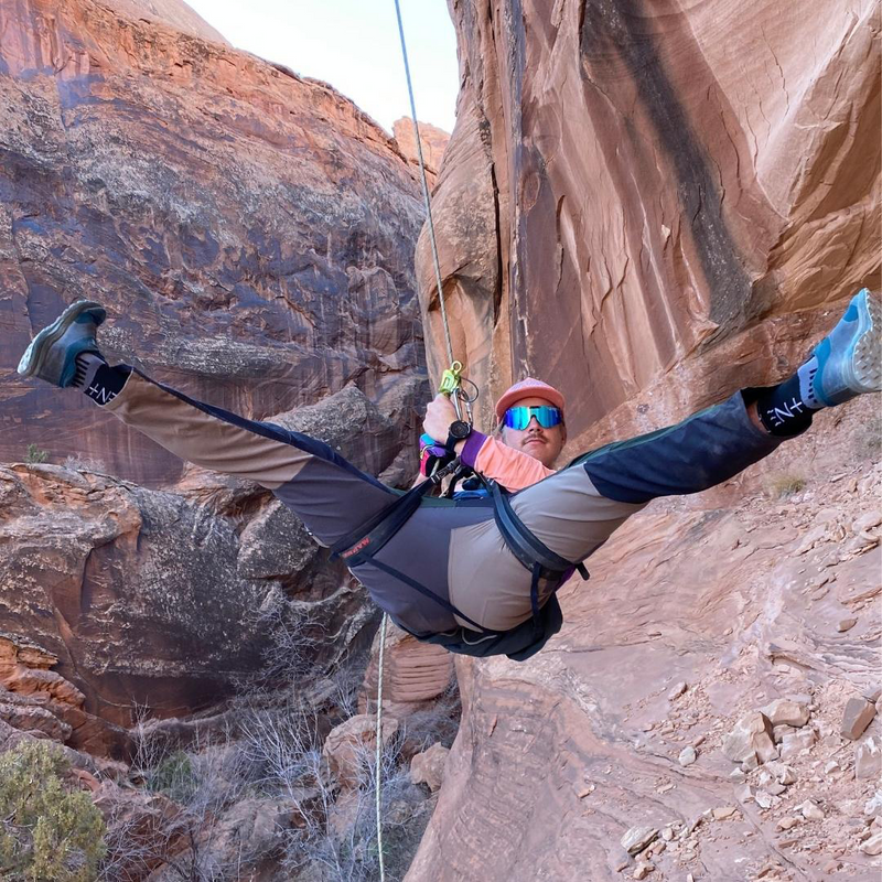/ Polarized Blue | i_can_stay_late.JPG | Man repelling in a canyon wearing Pit Viper Sunglasses