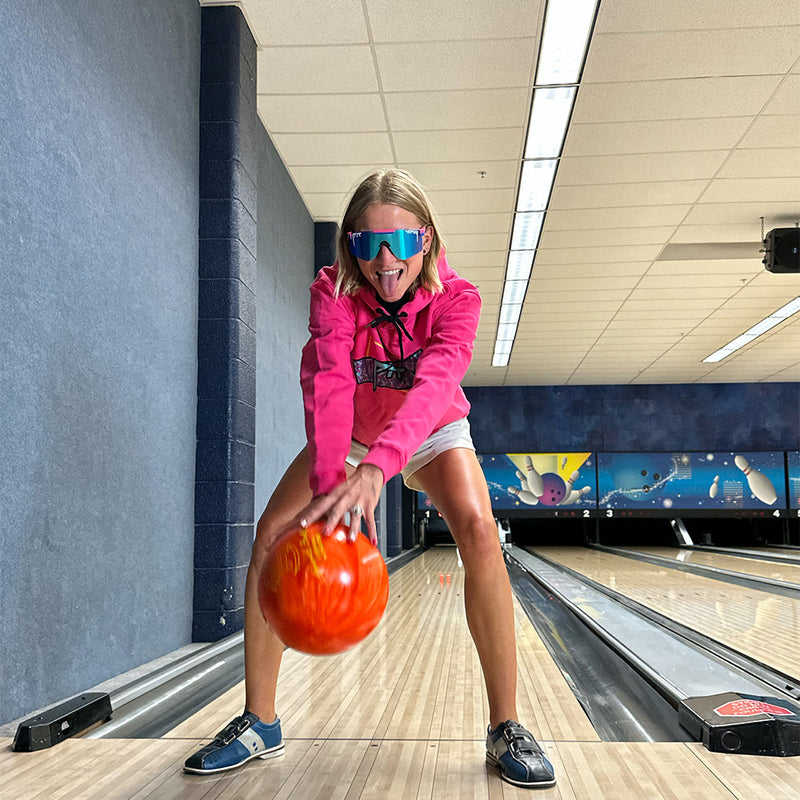 Polarized Blue / Narrow | photo_of_person.JPG | Woman bowling wearing The Leisurecraft Original from Pit Viper Sunglasses