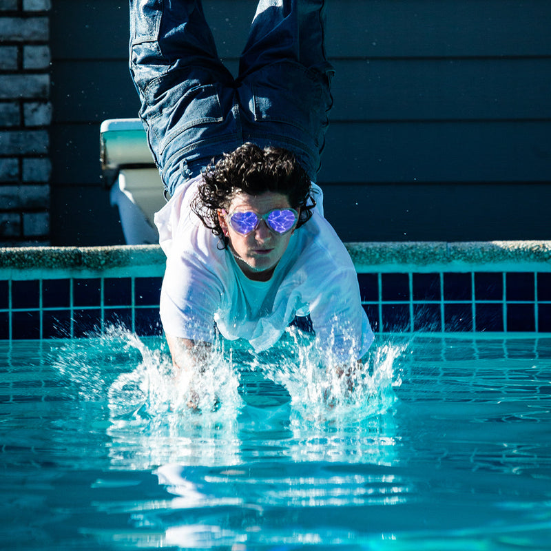 /Pink | photo_of_person_2.JPG | Man diving into a pool in The Rainbow Jellies Admirer from Pit Viper Sunglasses