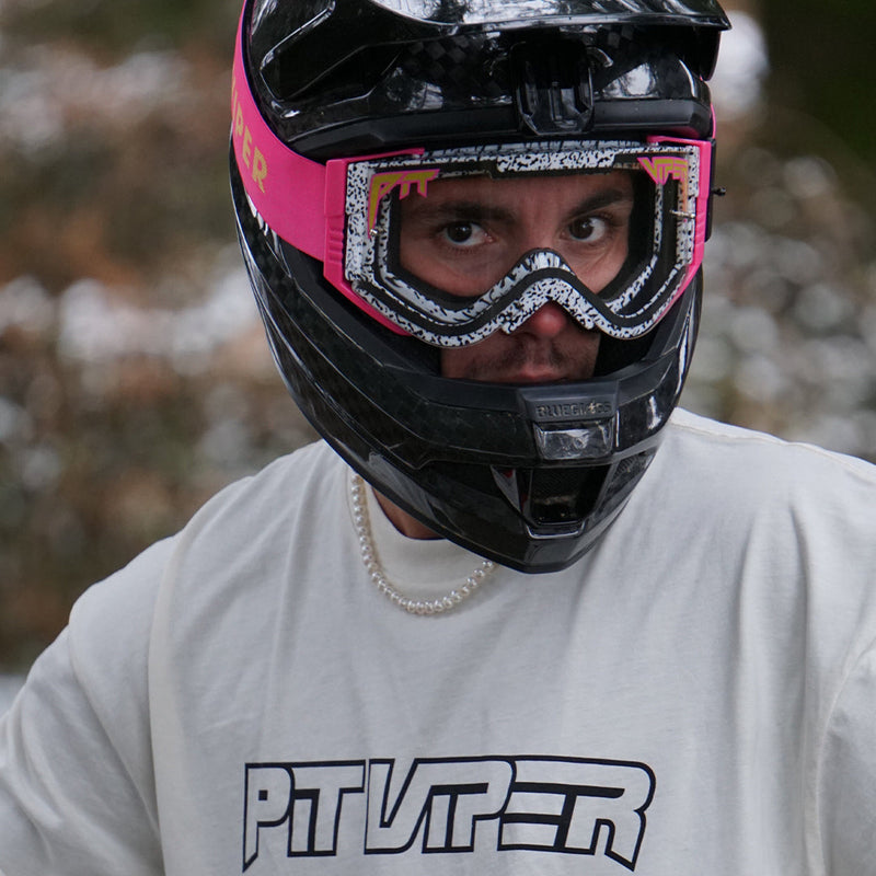 / Clear | Man wearing The Brapstrap with the clear lens by Pit Viper Sunglasses