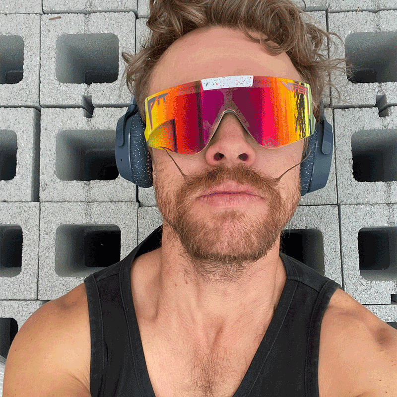 / Network | he_said.JPG | A man with headphones on wearing Pit Viper Sunglasses